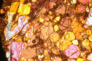 Illustration for article titled The Insides of Meteorites Are Nature's Stained Glass